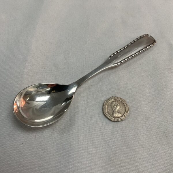 Vintage Georg Jensen silver caddy spoon with hallmarked silver.