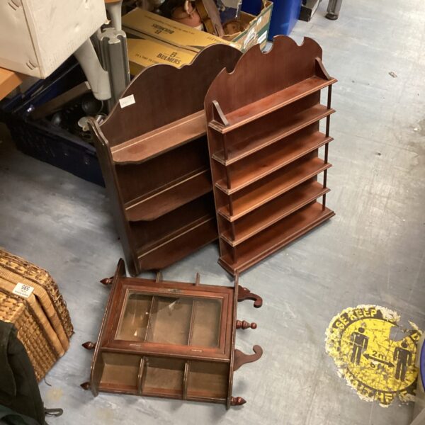 Vintage wooden display shelving units with glass fronted cabinet.