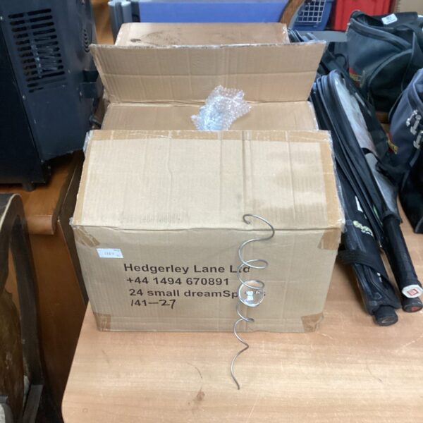 Two boxes of new dream spirals for decorations and crafts.