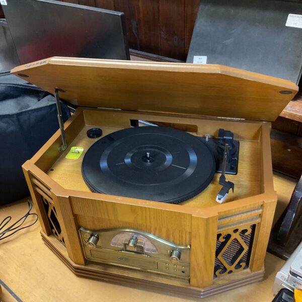 Side view of a vintage retro music centre with turntable.