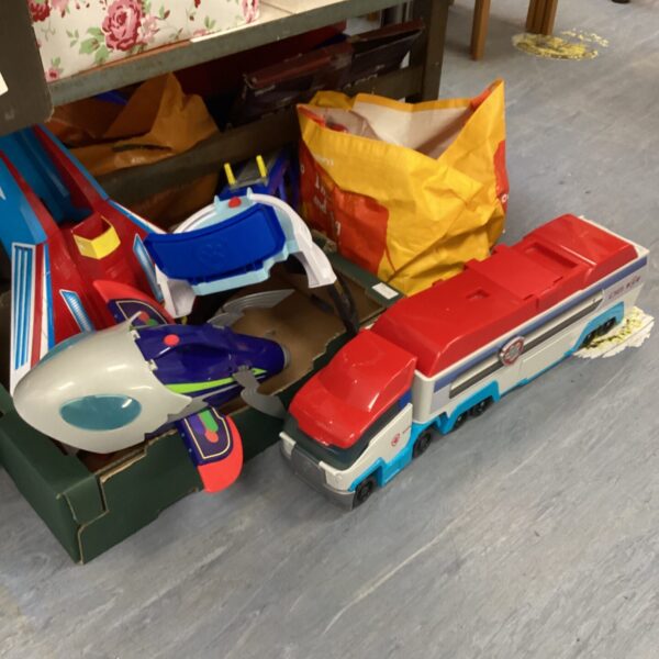 Collection of colourful Paw Patrol vehicles for imaginative play.