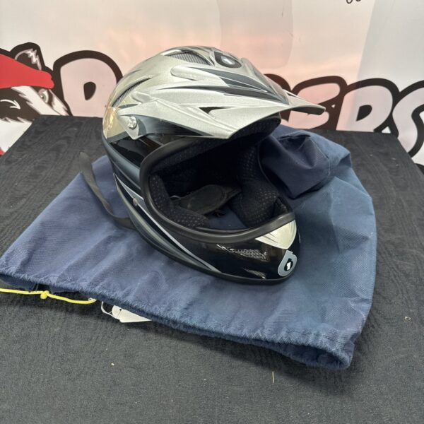 Sixsixone motocross helmet, showing wear and tear.