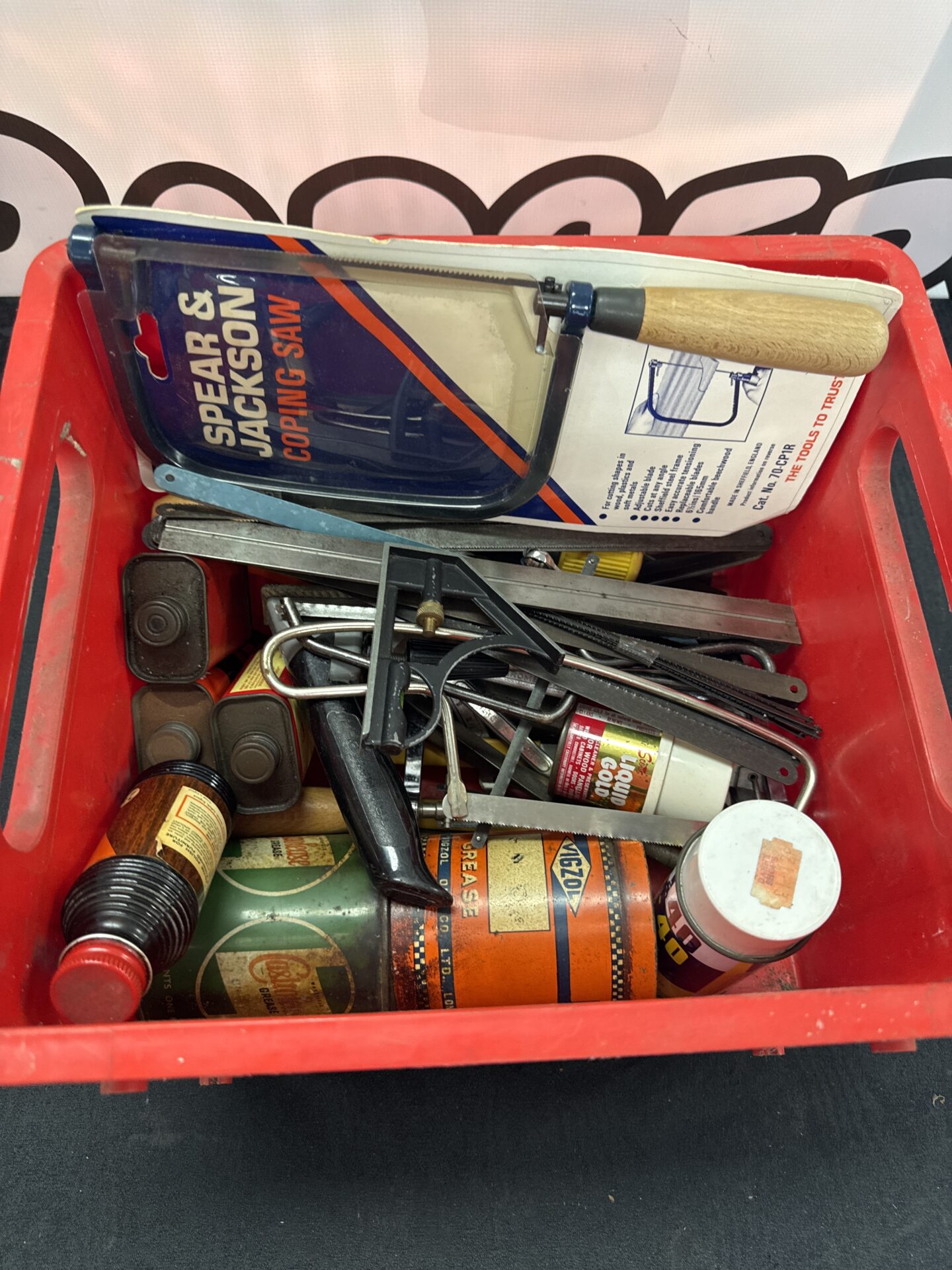 852 Box of mixed items inc vintage grease tins & new spear & Jackson coping saw
