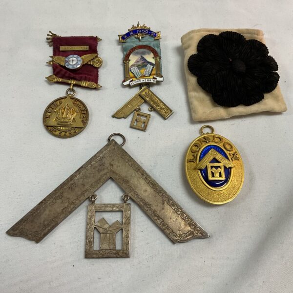 Vintage Masonic jewels collection including Ariel Chapter and Worshipful Master pieces.