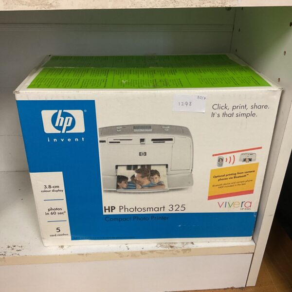 HP Photosmart 325 printer showing the device and packaging.
