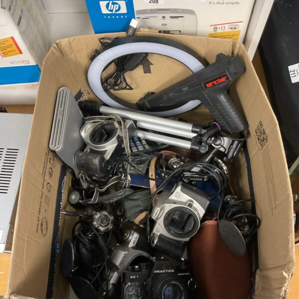 Vintage camera lot including Canon and a Sinclair light gun.
