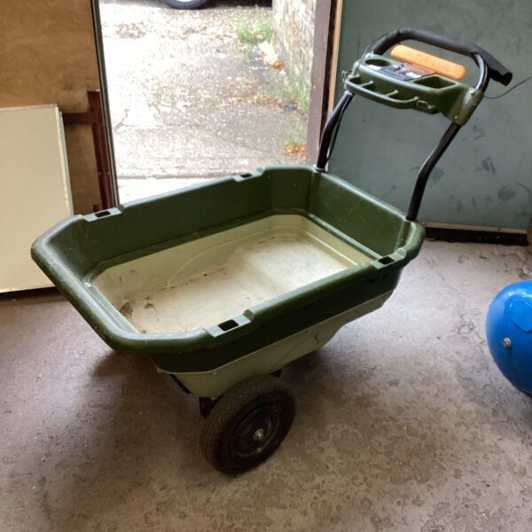 Used Luvcart electric garden barrow for outdoor use.