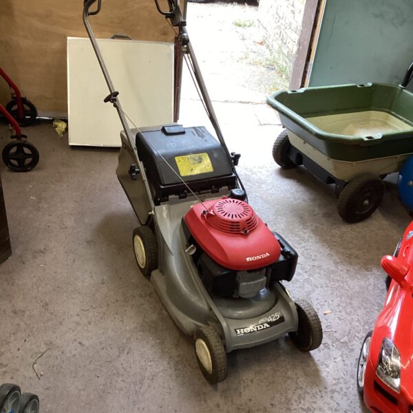 Honda HRB425C petrol lawn mower in used condition.