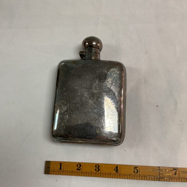 Antique silver plate hip flask with a screw top.