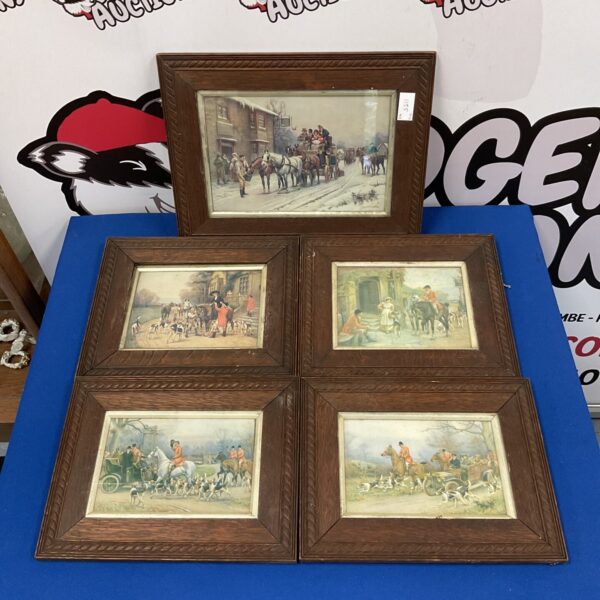 Set of five vintage hunt prints in oak frames.