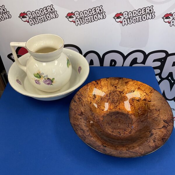 Victorian wash bowl and jug set with floral pattern.