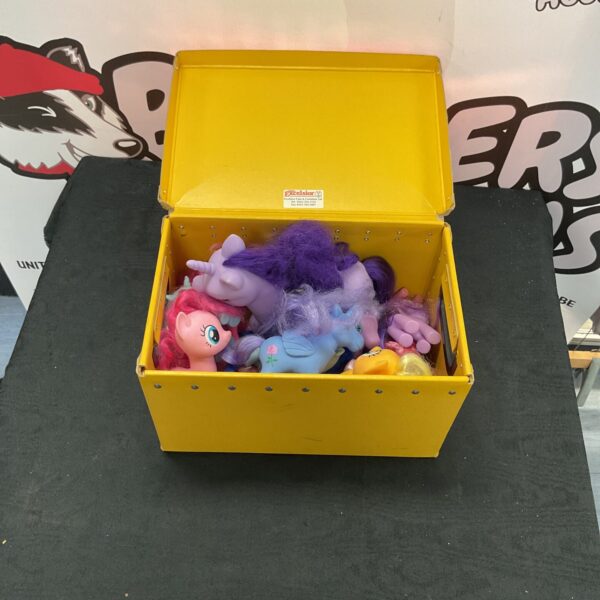 Vintage My Little Pony toy lot with colourful ponies.