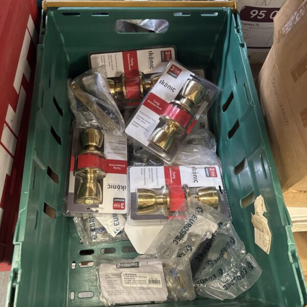 Tray of brass effect door knobs and sash locks for restoration.
