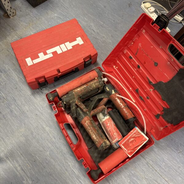 Hilti tool set with MD2000 sealant gun in a case.