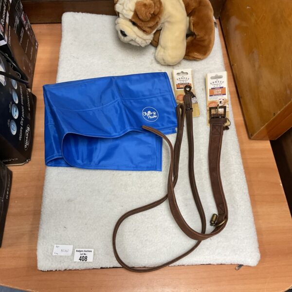 Dog accessories bundle including jacket, lead, collar, mat and toy.
