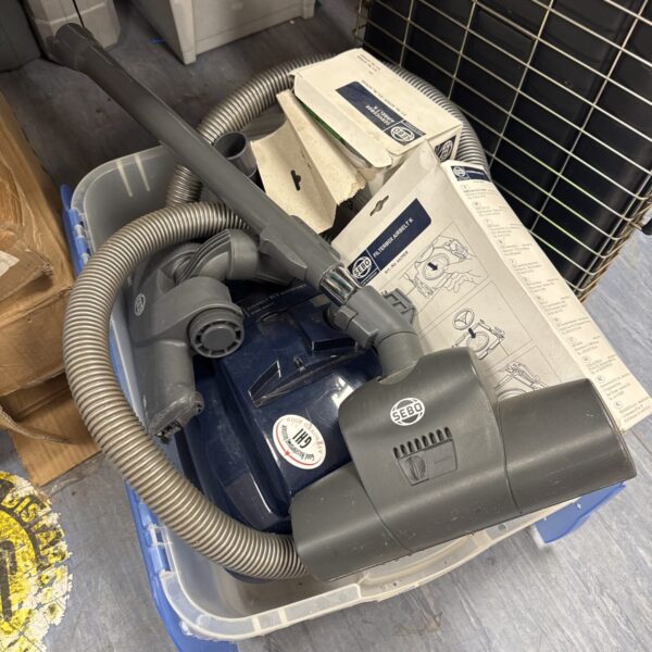 Sebo Airbelt K1 Komfort vacuum cleaner with attachments.