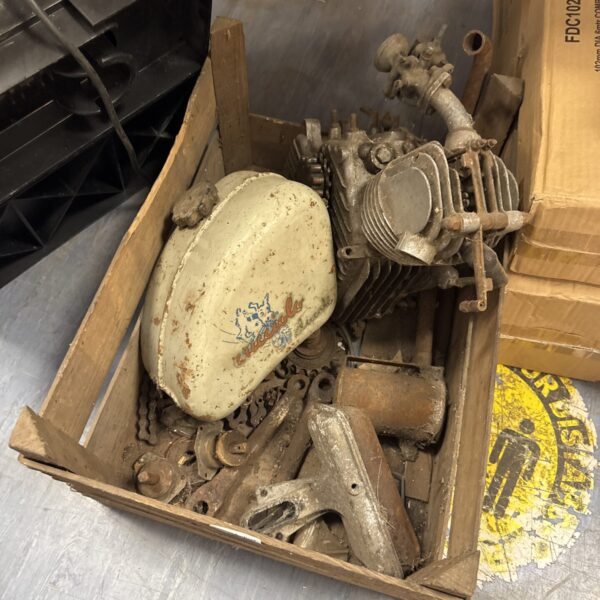 Vintage bicycle conversion kit with Ducati engine and Cucciolo fuel tank.