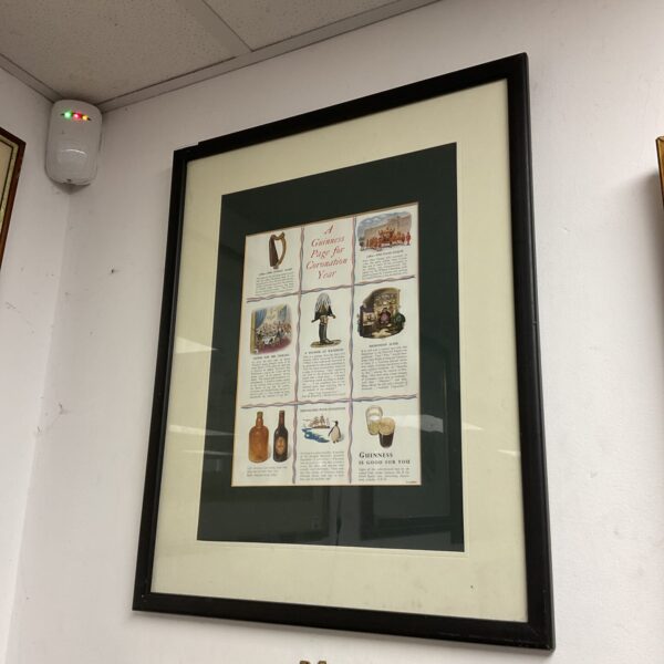 Framed vintage Guinness coronation year advertising print.
