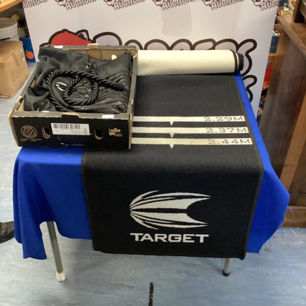 Target Darts mat and blackout curtains set for game room.