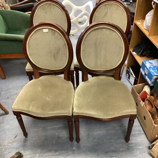 Set of four vintage green Regency dining chairs