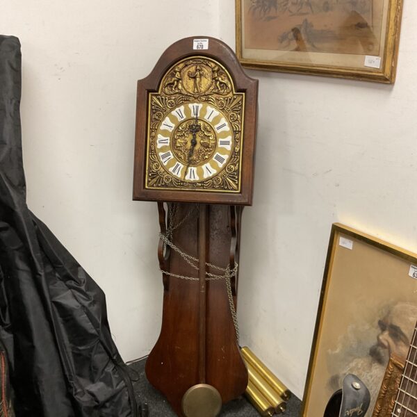 Large Dutch Friesian wall clock with pendulum and weights.