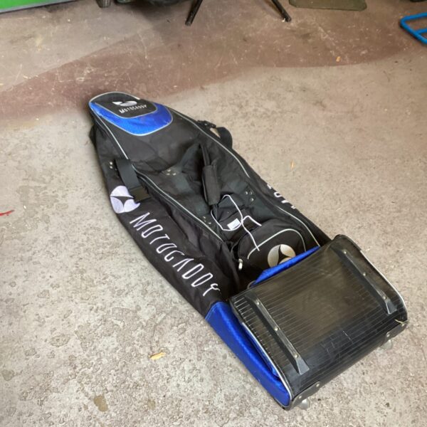 Black Motocaddy golf travel bag for club protection.