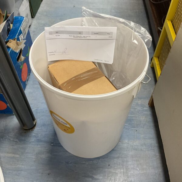 New beer making set inside a plastic tub, ready for home brewing.