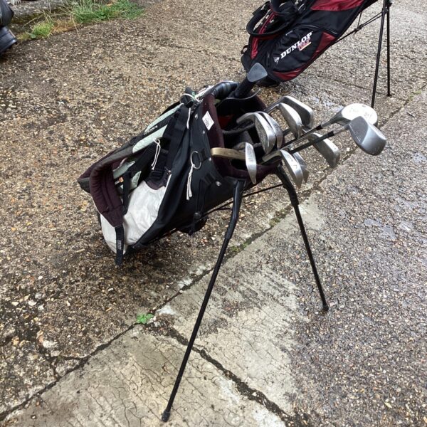 Mixed Dunlop golf club set with carry bag for sale.