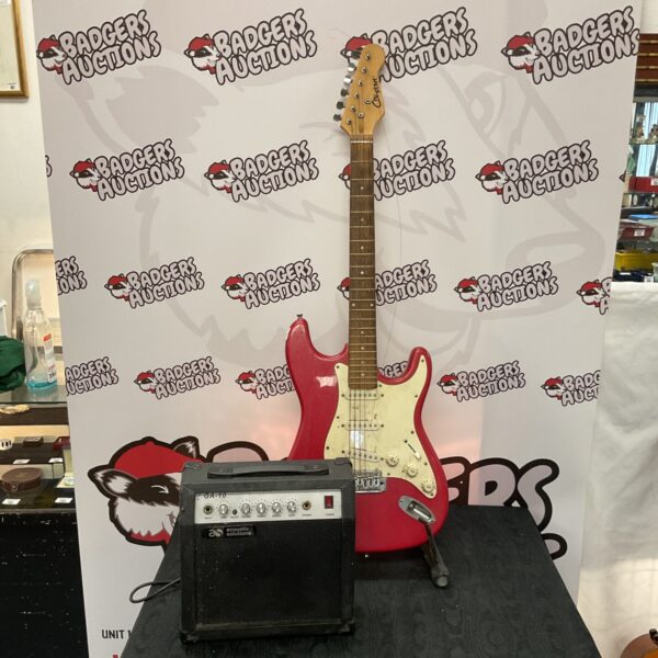 Red Cheetah electric guitar with Acoustic Solutions amplifier combo.