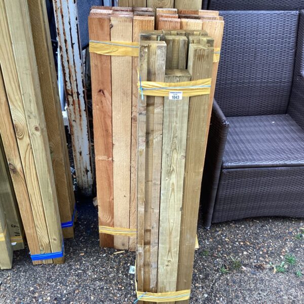 Three bundles of timber secured with plastic strapping, ready for projects.