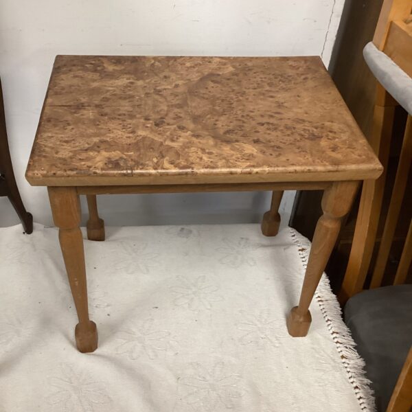 Antique walnut side table with tiger eye grain detail.