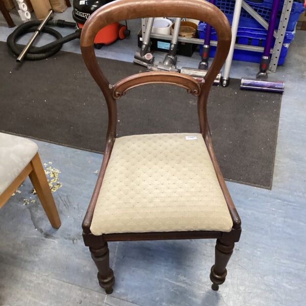 Antique Victorian balloon back chair with mahogany frame.