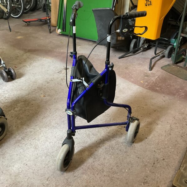 Days mobility walker with three wheels and wire basket.