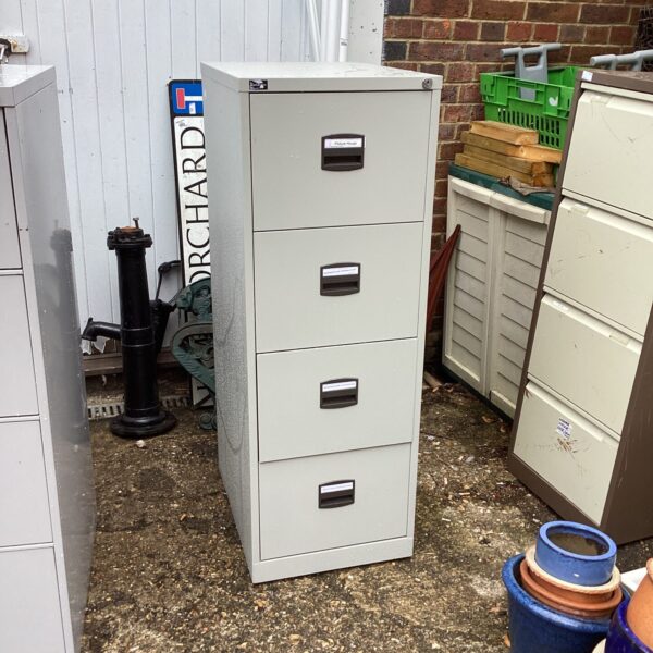 Grey vintage Dams filing cabinet with four drawers.