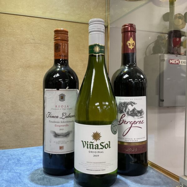 Wine lot featuring Vinasol 2019 and Bergerac 2023 bottles.