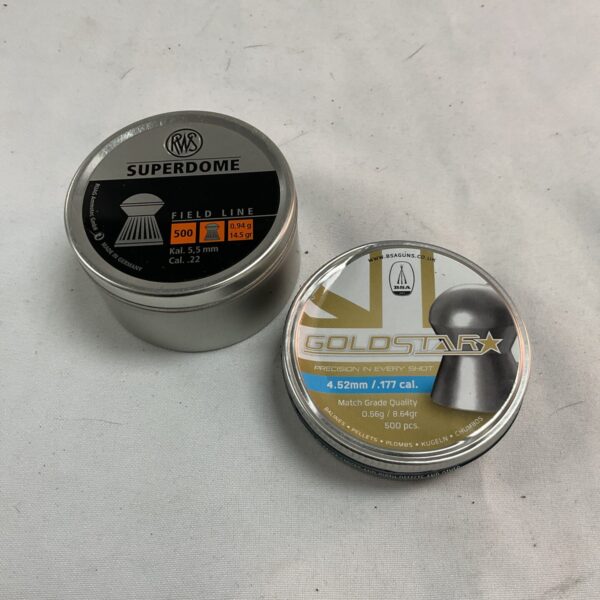 Two tins of airgun pellets, Goldstar and Superdome brands.