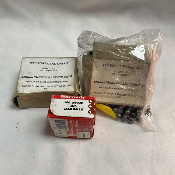 Vintage soft lead balls in a labelled bag, .36 calibre ammunition.