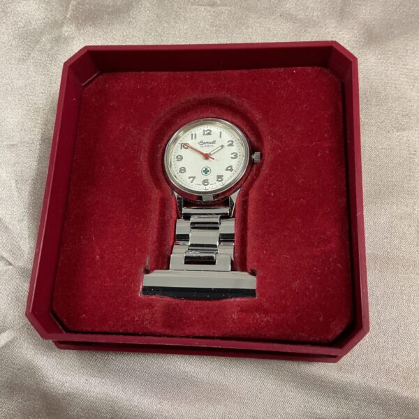 Vintage Ingersoll nurses quartz watch with stainless steel bracelet.