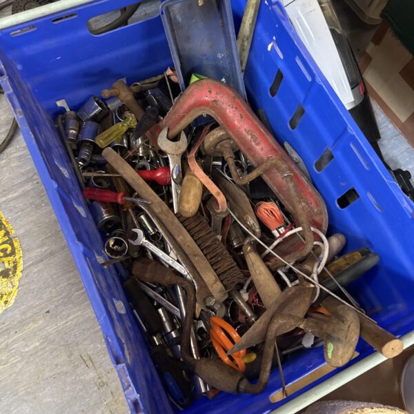 Tray of assorted hand tools for workshop or DIY projects.