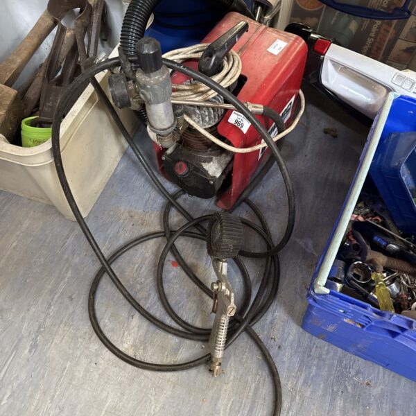 Vintage Jumbo air compressor with tyre inflator attachment.