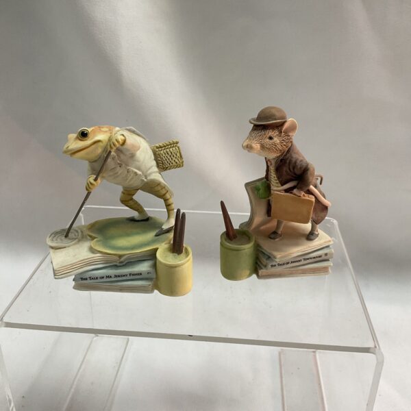 Vintage Beatrix Potter figurines of Jeremy Fisher and Johnny Town Mouse.