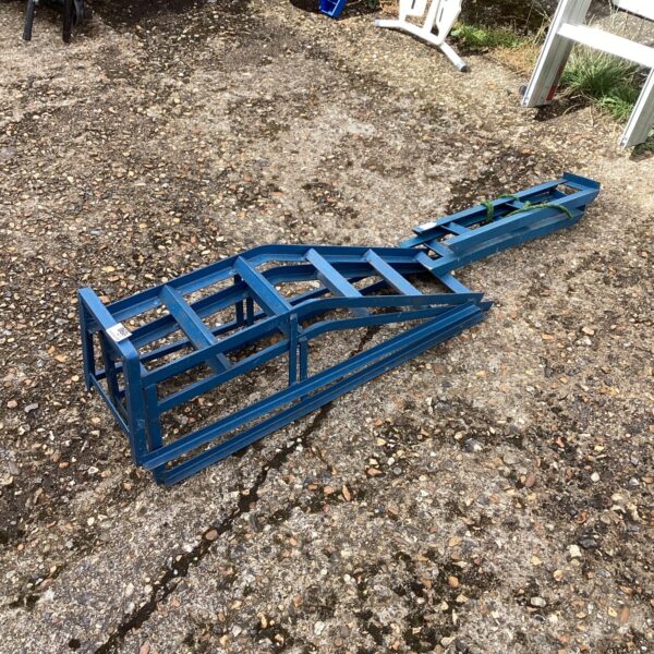 Heavy-duty steel car ramps for vehicle maintenance and repair.