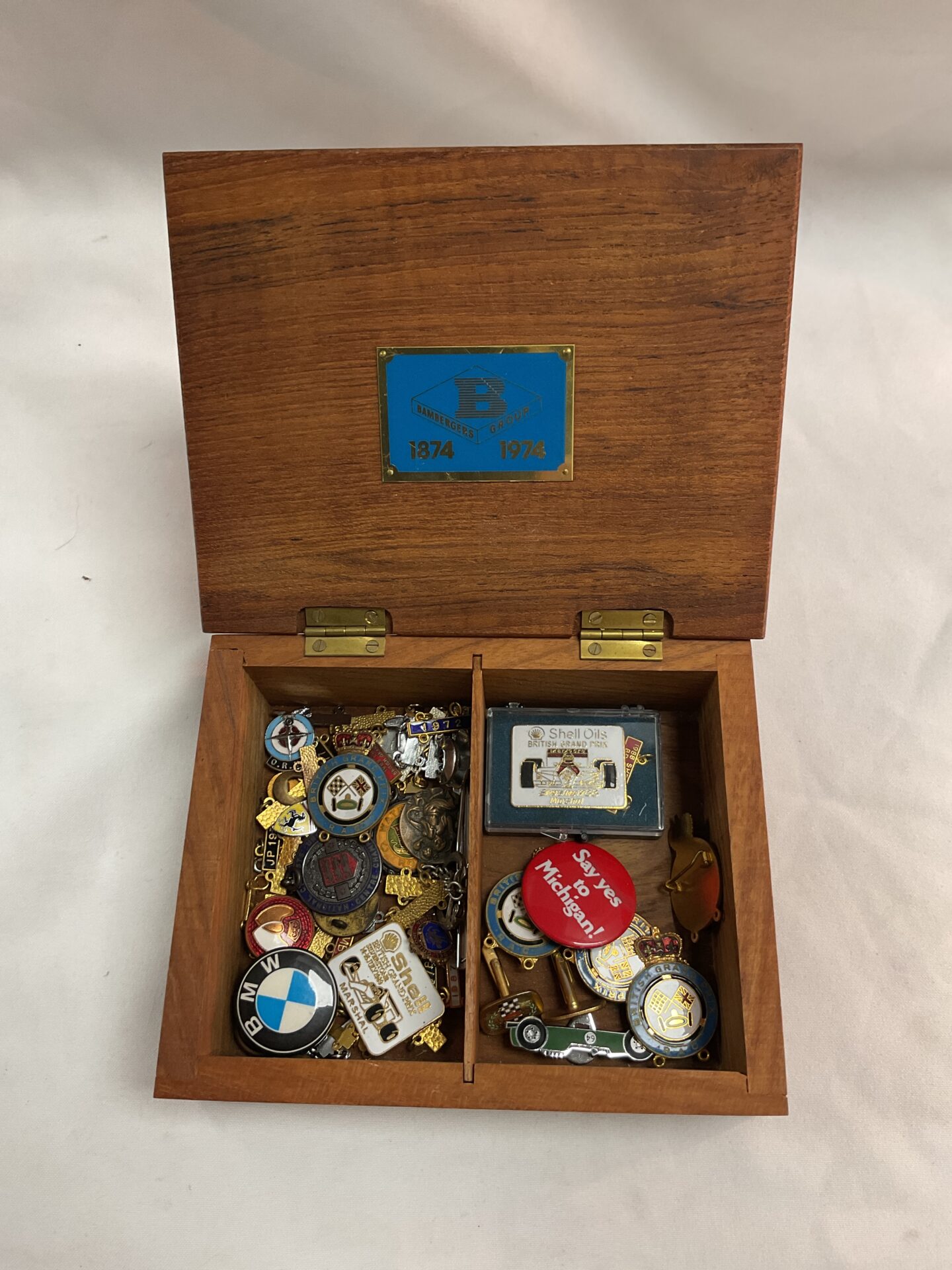 700 Box of assorted enamel motoring pin badges Inc British gp