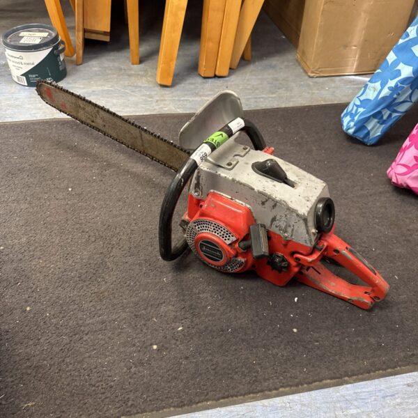 Vintage Jonsered 80 petrol chainsaw for garden and forestry work.
