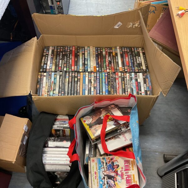 Large lot of DVDs including multiple box sets and film collection.
