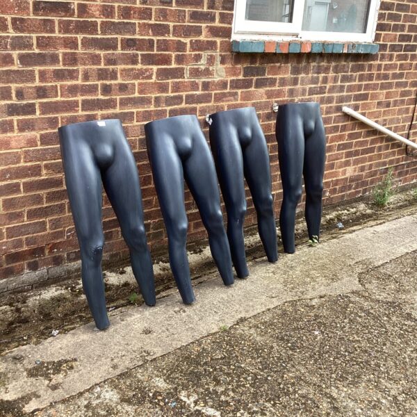 Lot of four half mannequin torsos for clothing display.