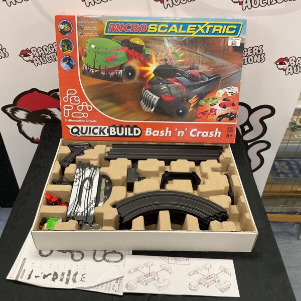 Microscalextric Bash N Crash slot car racing set in box.