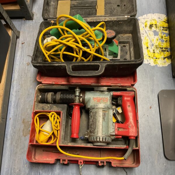 Vintage Hitachi TE17 hammer drill and planer in a tool case.