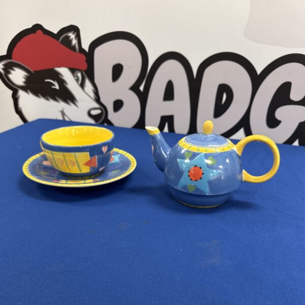 Colourful Whittard of Chelsea tea for one set with teapot and cup.