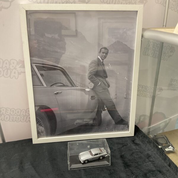 Sean Connery James Bond print with Aston Martin DB7 model.